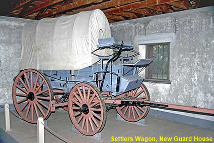 Settlers Wagon in New Guard House, Fort Laramie, WY, USA Settlers Wagon in New Guard House, Fort Laramie, WY, USA