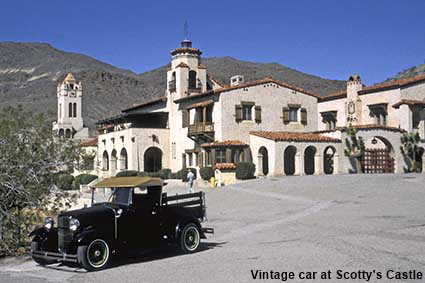 Vintage car in front of  Scotty's Castle, Death Valley, CA, USA