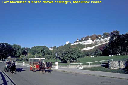 Fort Mackinac & horse drawn carriages, Mackinac Island, MI, USA