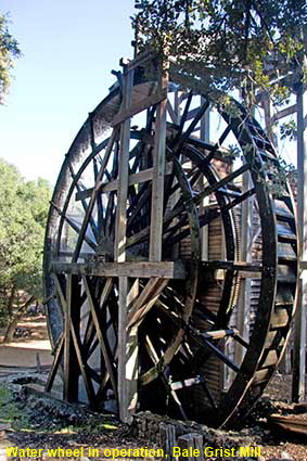  Water wheel in operation, Bale Grist Mill, St Helena,  CA, USA