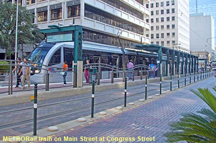  METRORail train on Main Street at Congress Street, Houston, TX, USA